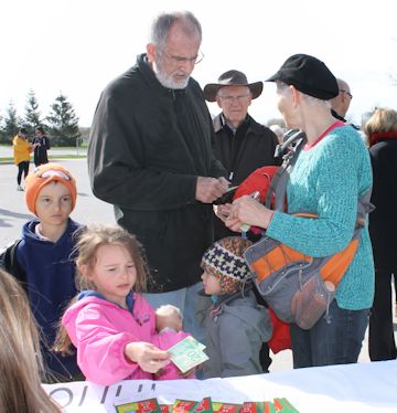 Gord (centre) and Margie Austman (right) of Kincardine, with grandchildren, Ben (left), 7, Madison, 5, and Lauren Hancock, 3, of Alliston, register for the Hike for Hospice